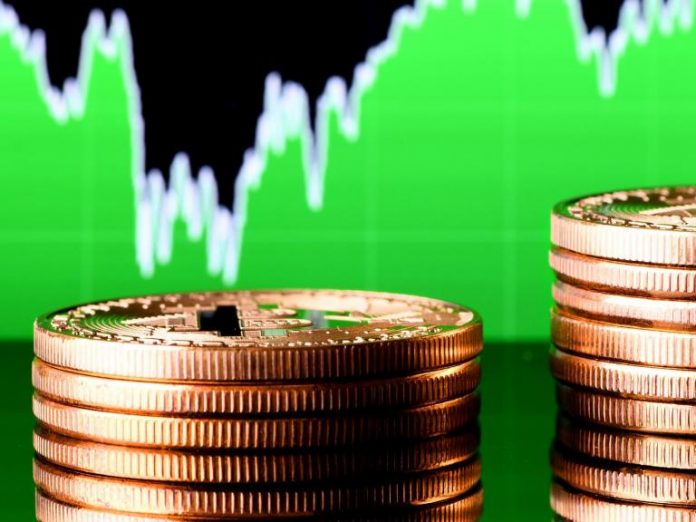 Bitcoin rate soars $500 in 10 minutes as cryptocurrency presses towards record high