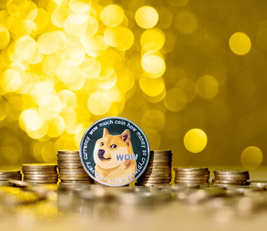 Dogecoin Kinds Symmetrical Triangle, Rally On The Horizon?